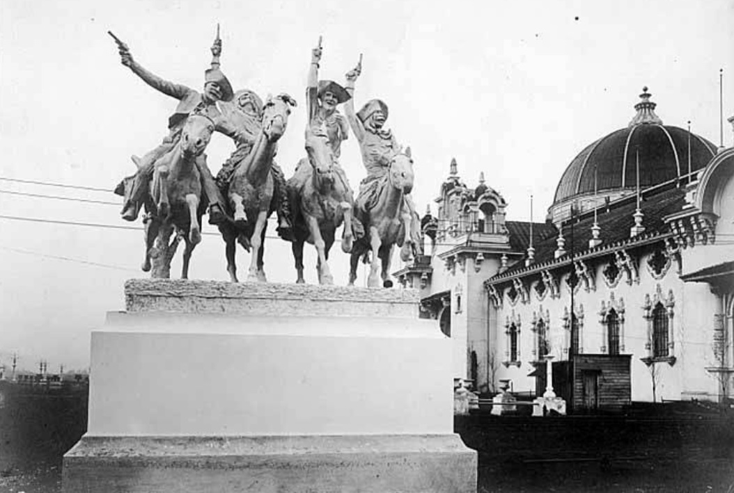 Remington sculpture, with Columbia Court under construction in the background.jpg